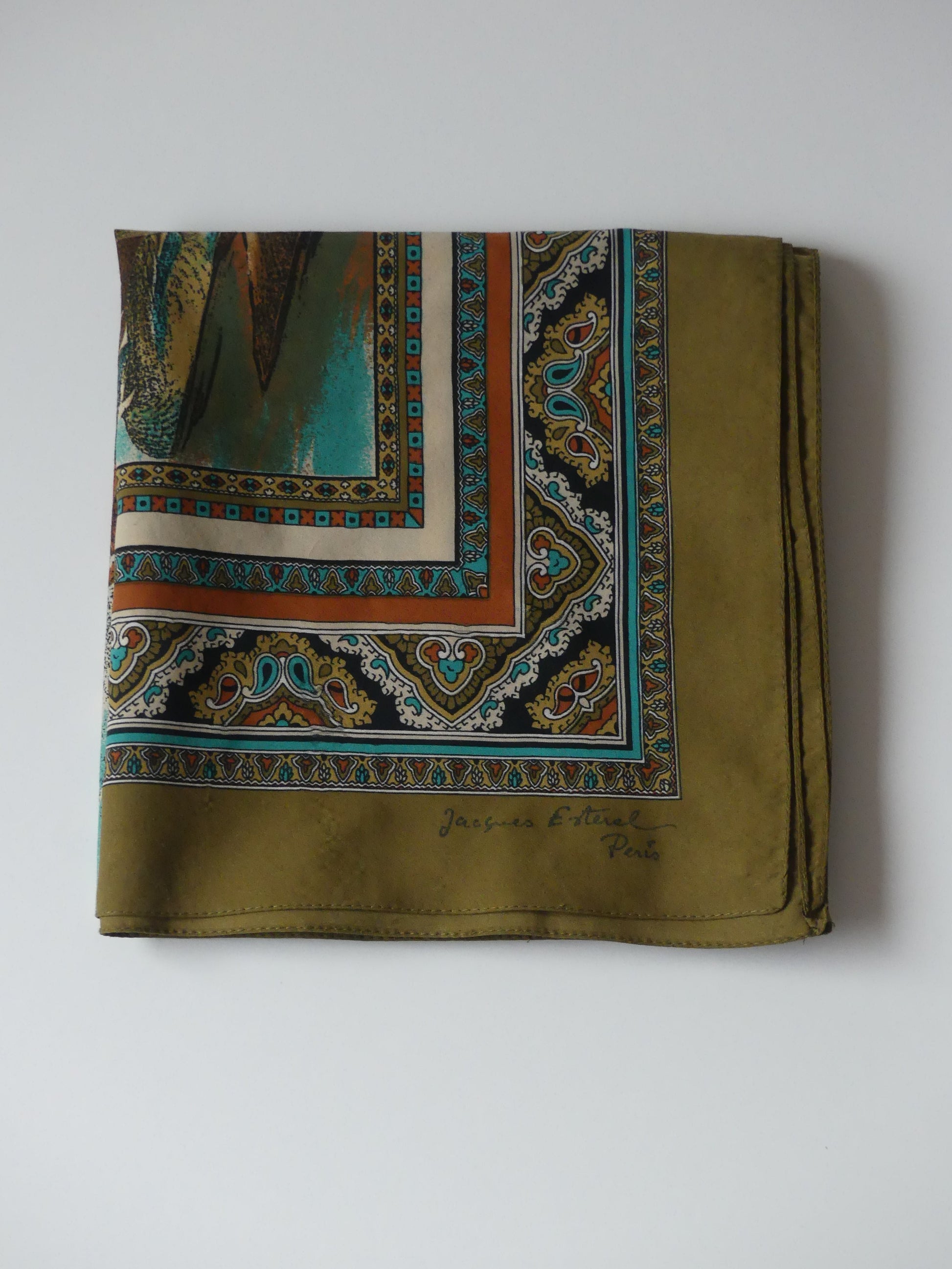 Step into timeless sophistication with our Countryside Elegance Scarf, a vintage-inspired accessory that exudes old-money charm. Featuring a serene pastoral design of graceful ducks amid lush foliage, this scarf captures the essence of refined countryside luxury.

With its intricate detailing and soft texture, this versatile piece effortlessly elevates any outfit—whether draped around your neck, tied to a handbag, or styled as a headpiece. Perfect for those who appreciate understated elegance.