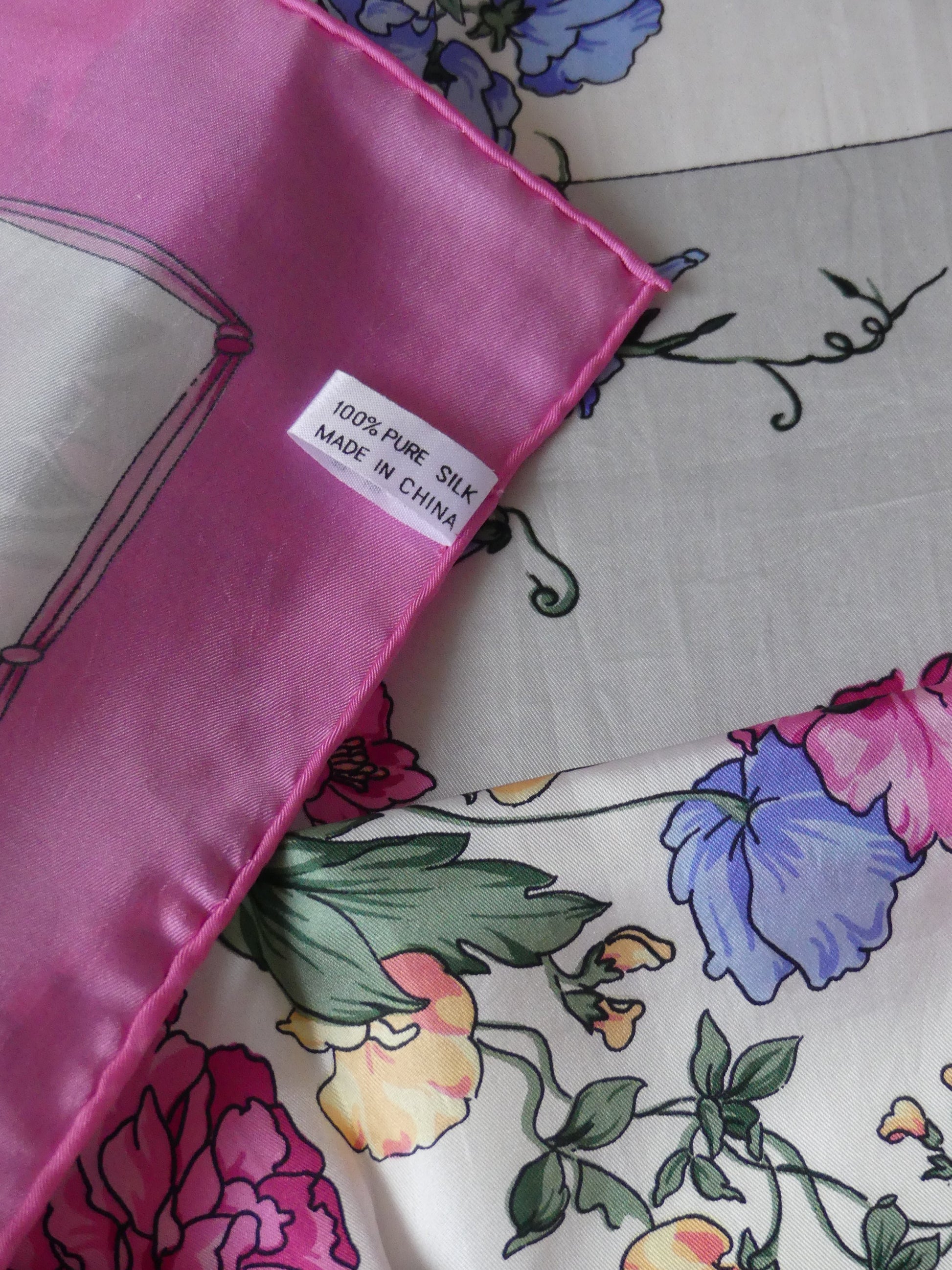 Floral Symphony Silk Scarf – Elegant 100% silk scarf with a vibrant floral pattern, luxurious accessory for women. Perfect as a neck scarf, headpiece, or handbag tie. 85cm x 85cm, sophisticated and timeless design for classic style at La Vague Vintage