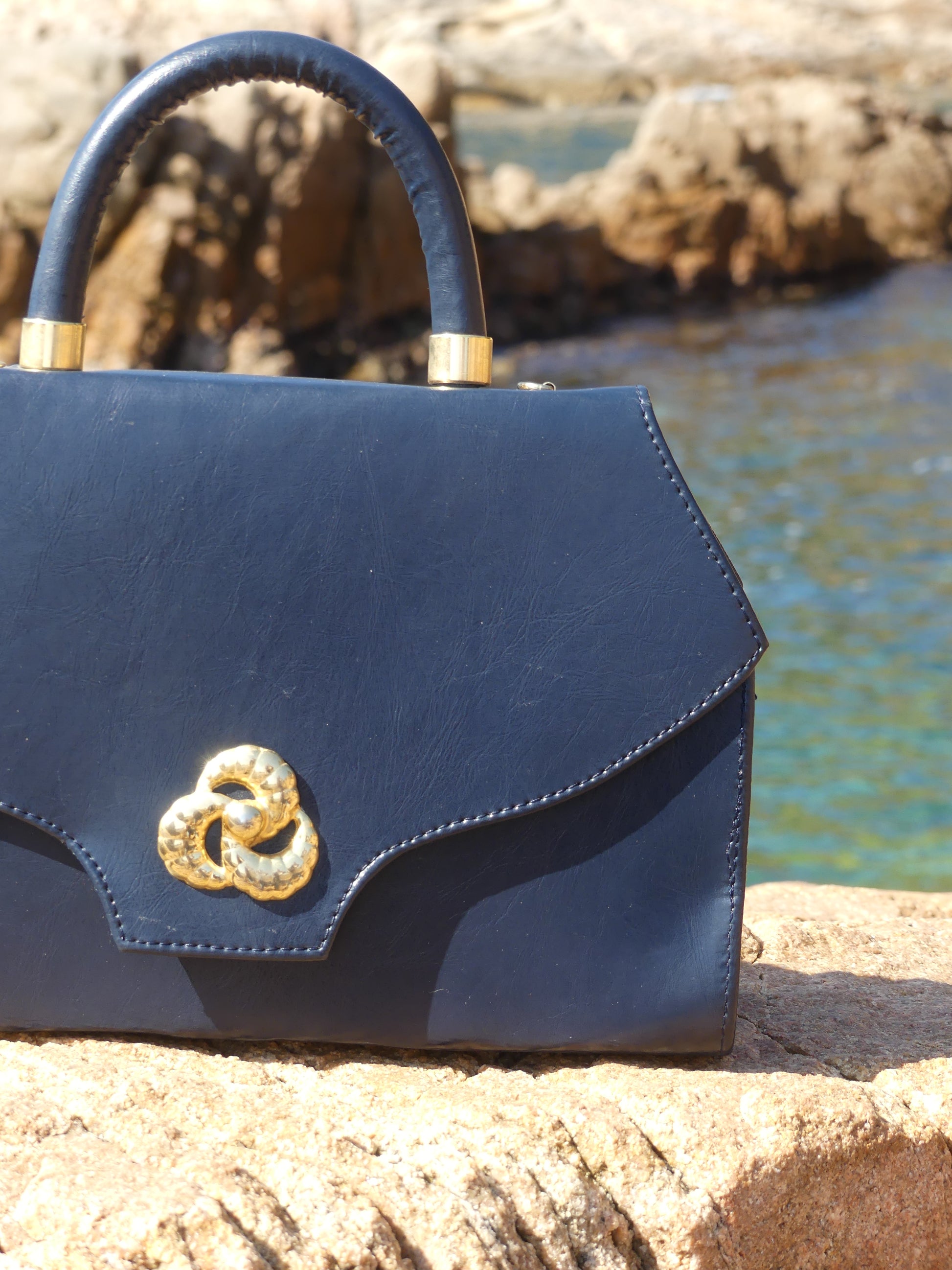Whether you’re heading to a seaside escape or a city stroll, the Blava Vintage Handbag is your go-to piece for effortless sophistication. Each piece is unique—part of a carefully curated vintage collection from La Vague Vintage.